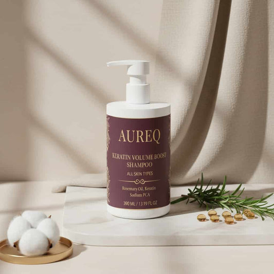 AUREQ Keratin Volume Boost Shampoo bottle with pump, designed for all skin types, placed on a neutral background.